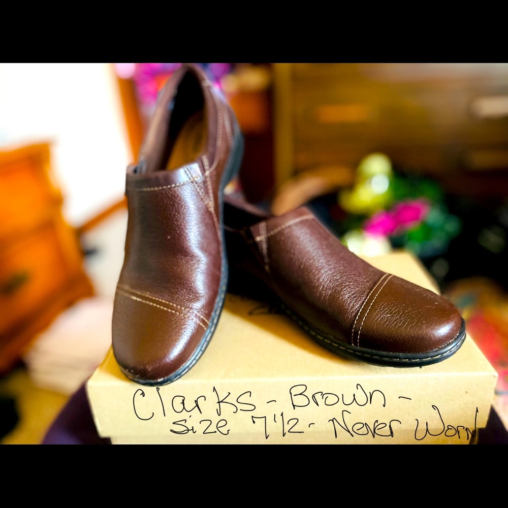 Never Worn, brown, size 7.5, Clarks slip on shoes.
